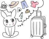 スーツケースのサイズを考えるウサギ